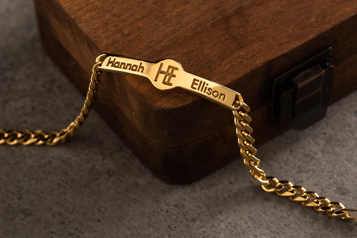 Close up of personalized 18k gold plated men's ID bracelet