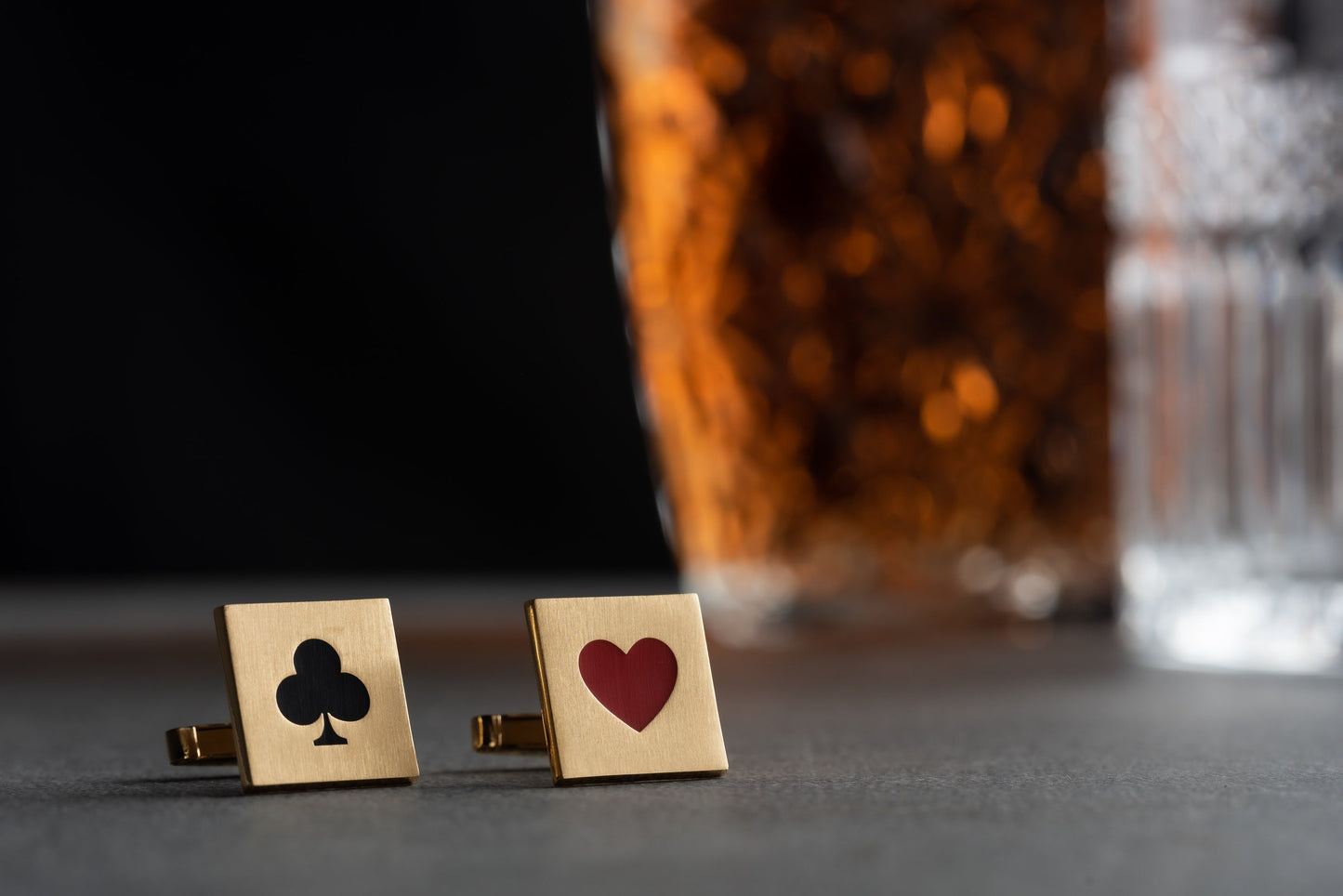 Close up of personalized poker card cufflinks in 18k gold finish